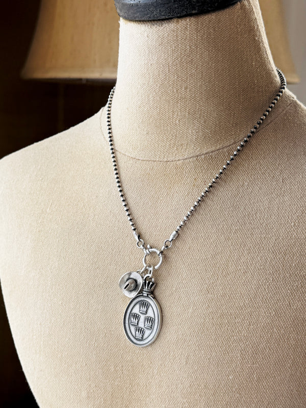 Regal & Heraldic Charms — Symbols of Nobility, Protection & Devotion