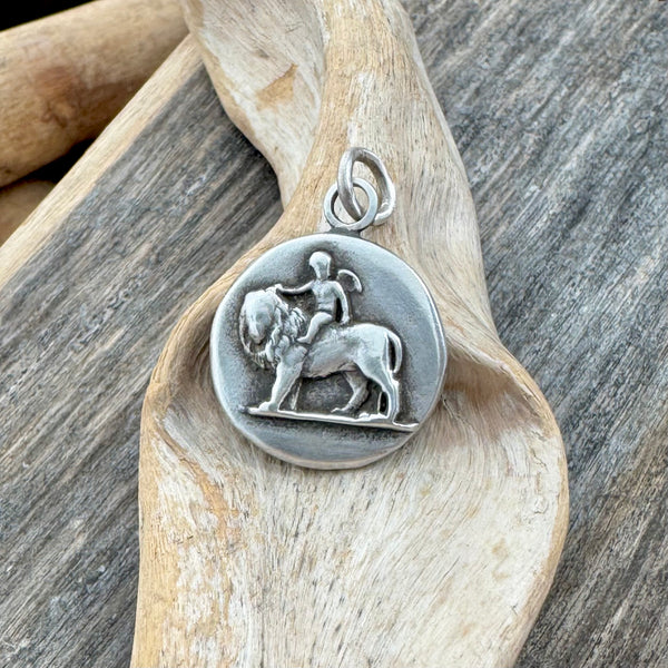 Sterling “Love Conquers All” Charm